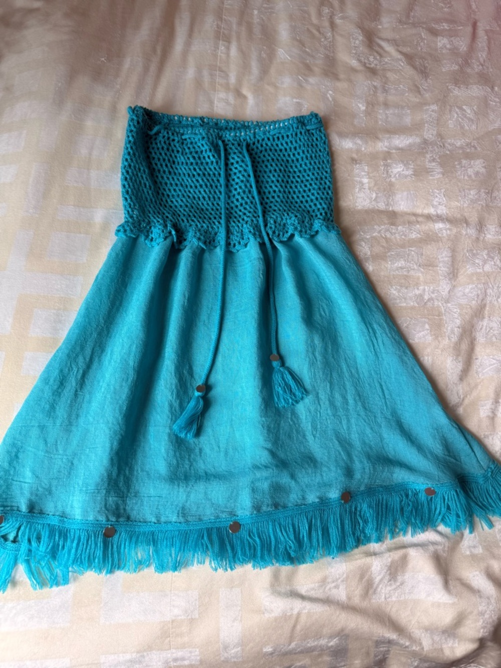 Venus Bright, blue strapless, crocheted bathing suit cover-up with bling